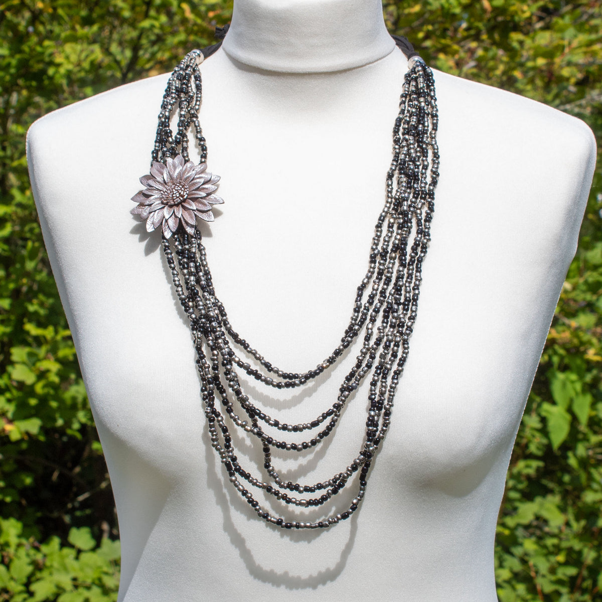 Multi-strand black &amp; silver necklace with silver leather flower | Necklace - The Naughty Shrew